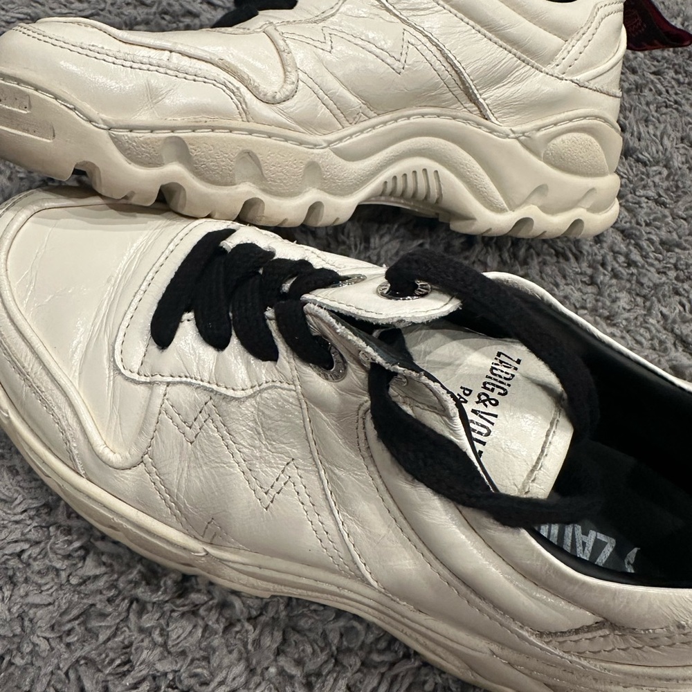 Distressed sneakers